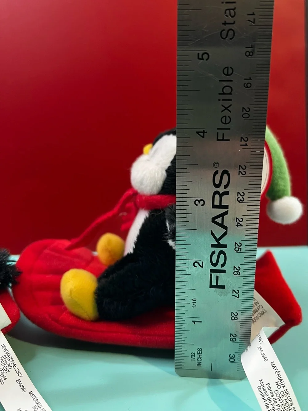 Hallmark Black & White Penguin with Red Scarf Plush Sledder
